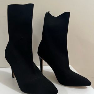 Black tall ankle sock boot